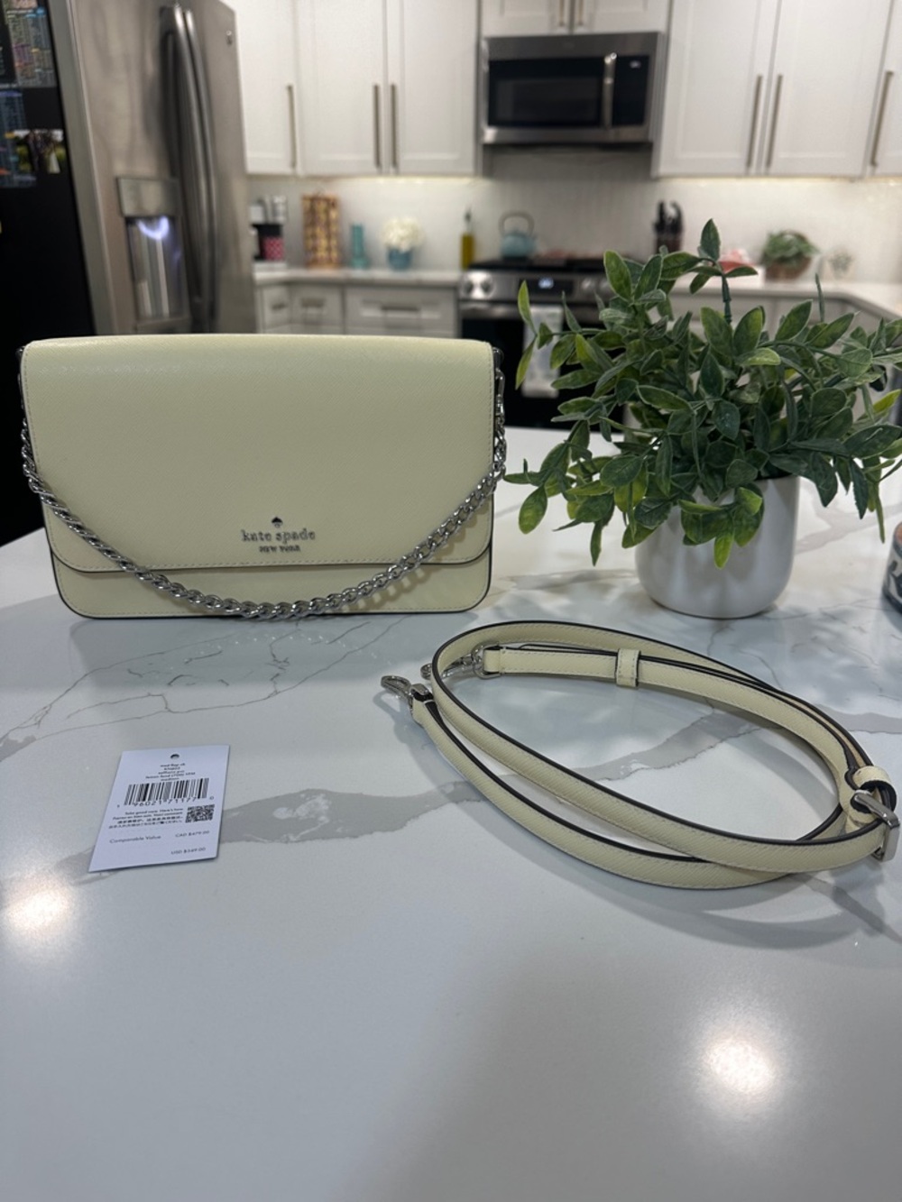kate spade pale yellow leather crossbody bag with silver chain